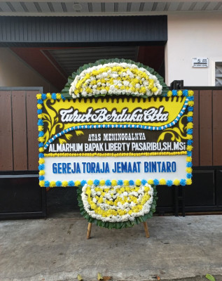 Papan Bunga Duka di Kao Teluk